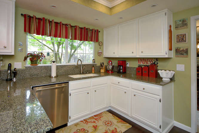 Stainless Appliances & White Cabinetry