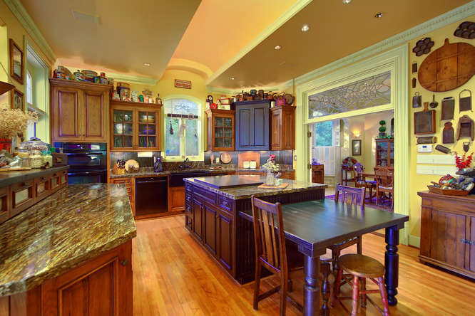 Remodeled Kitchen with Black & Gold Granite Counter Tops