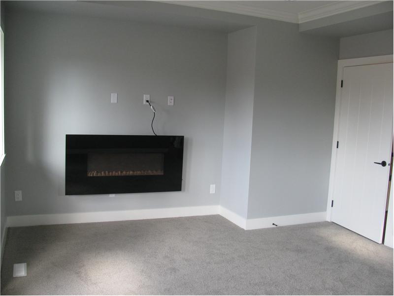 Above Master bedroom with electric fire place