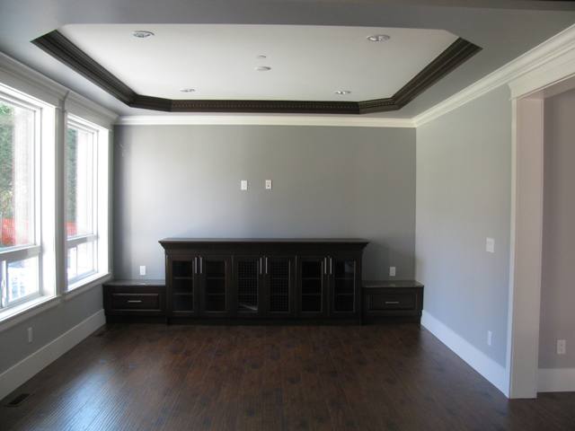Family room with entertainment cabinets and wired for hi tech surround sound