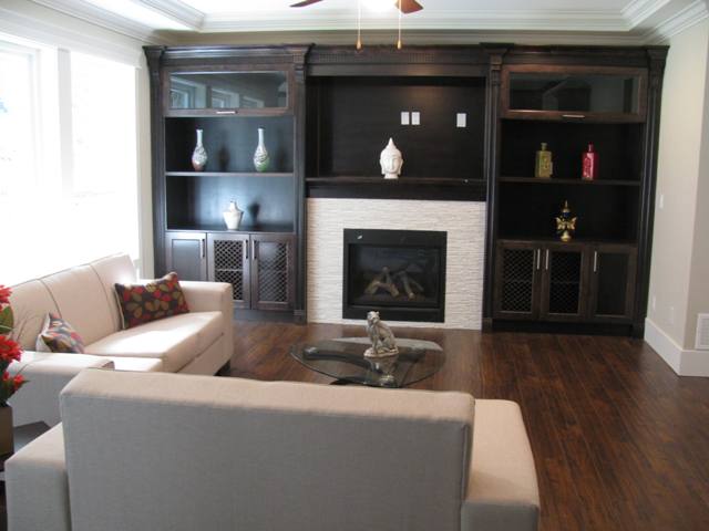 Bright Family room with gas fireplace and entertainment centre