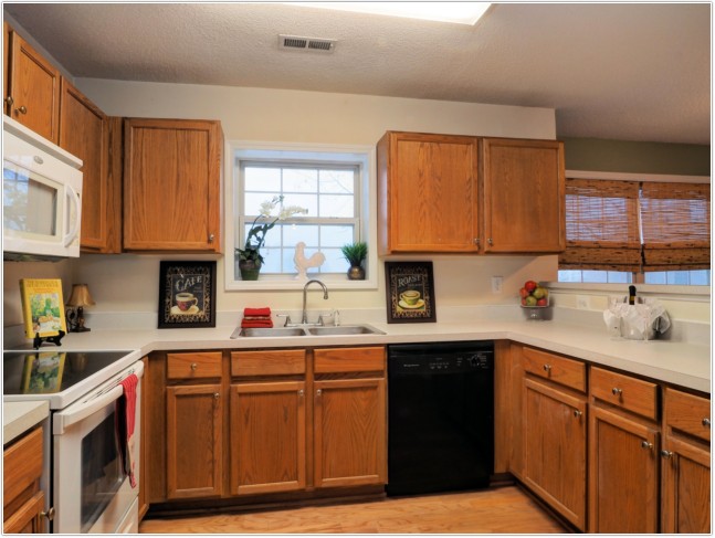 Kitchen with tons of cabinet space and wood floors