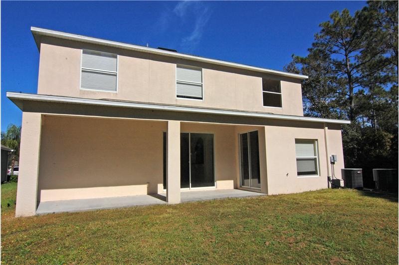 Rear View of Home with Large Covered Patio
