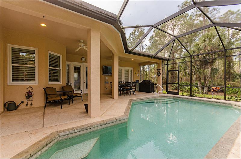 extended lanai with a propane heated salt water pool