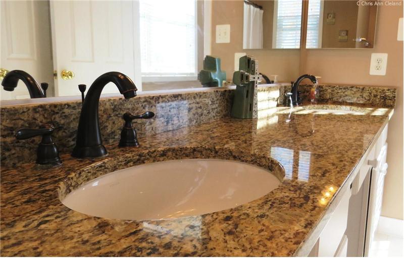 Granite Counters & Dual Sinks in Owner's Bath