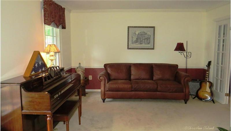 Formal Living Room is to the Left as you enter into the Foyer