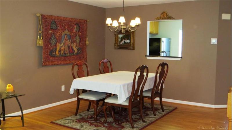 Laminate Wood Floors in Dining Room, Living Room & Kitchen