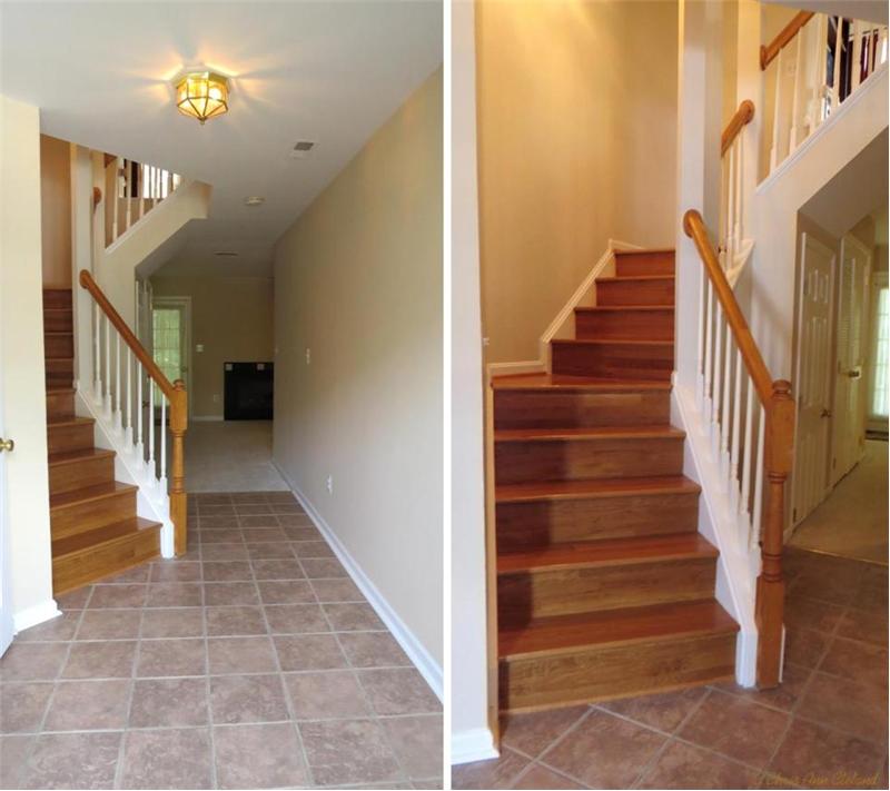 Foyer Entry and Hardwood Staircase to Main Level