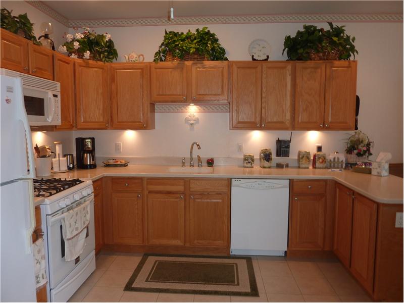 Kitchen/ Ceramic Floors/Corian Countertops
